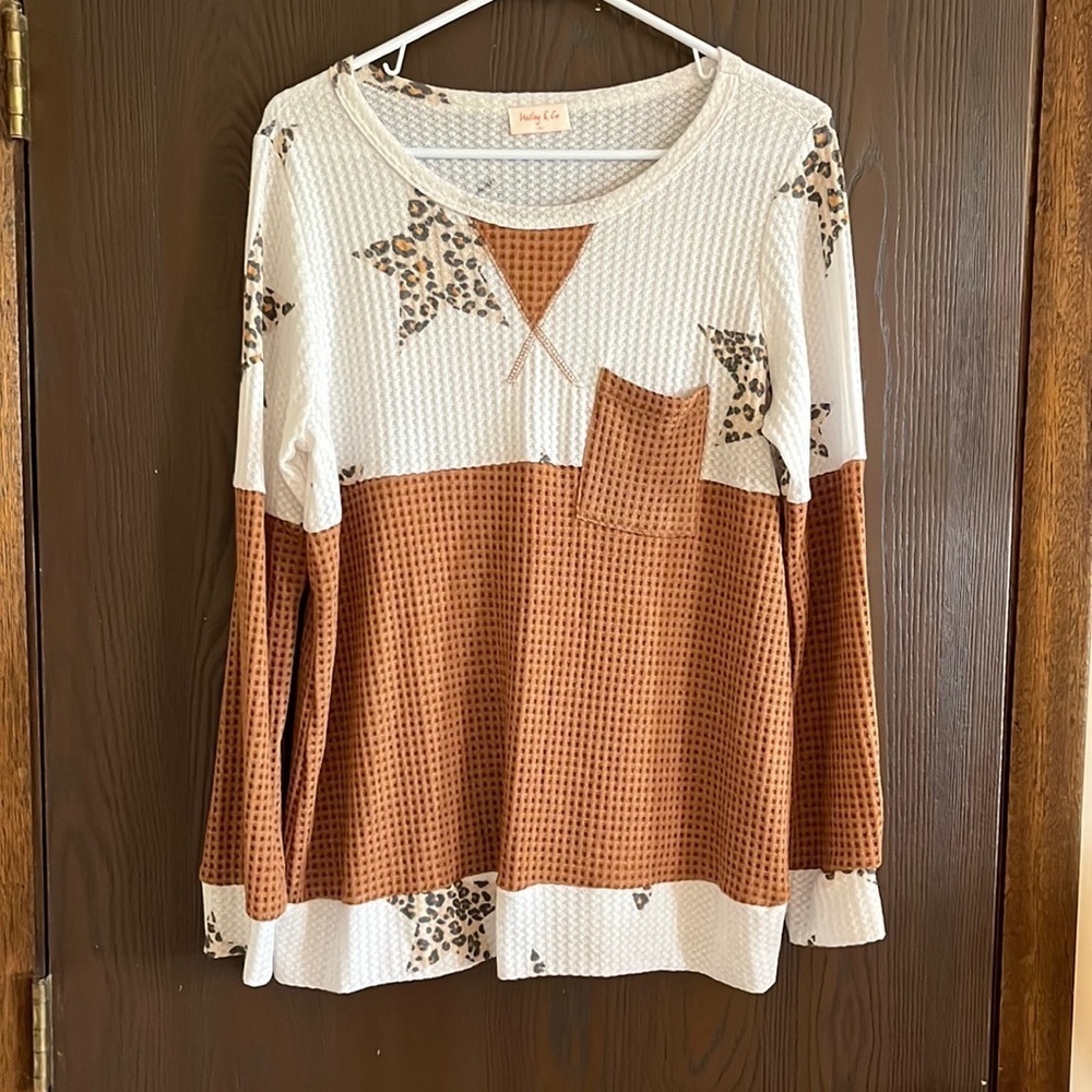 Kailey & Co. long sleeved waffle caramel with cream and stars in animal print. L